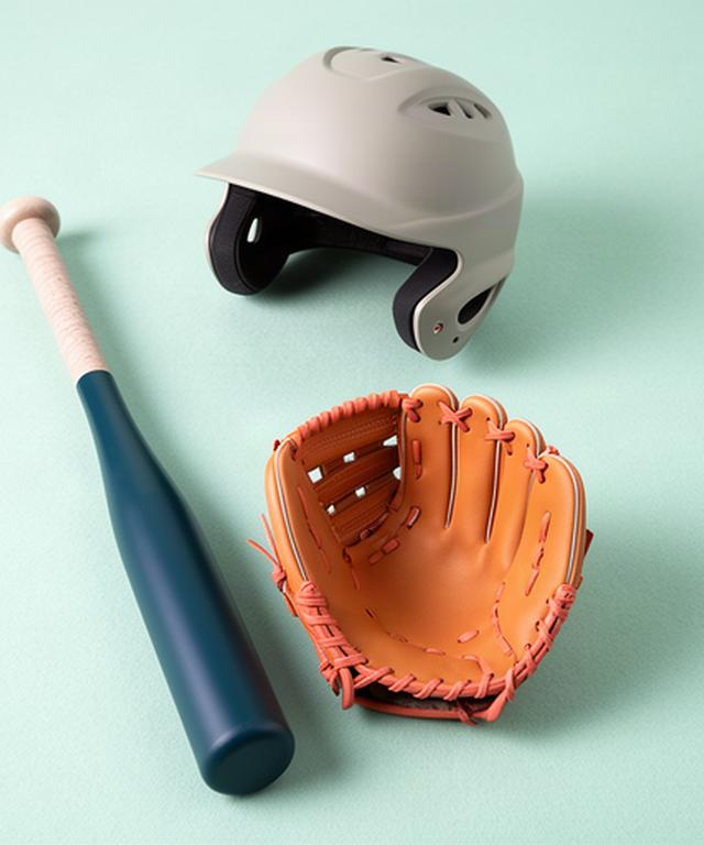 少年野球のスターターセットとして並べた軽量バットと幼児用グローブとヘルメット